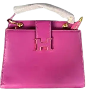 Hermès Constance Bag Trapezoidal shape, a prominent "H" clasp on the front, and a Single Top Handle with distinctive gold-tone hardware.