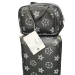 Travel Set includes a Rolling Suitcase and a Smaller Matching Bag, that Showcases Black and White star and monogram pattern