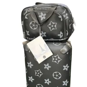 Travel Set includes a Rolling Suitcase and a Smaller Matching Bag, that Showcases Black and White star and monogram pattern