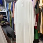 White Butterfly-style Abaya or Kaftan, featuring Floral Embroidery or beaded accents on the upper chest