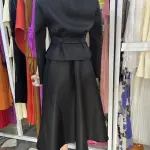 Elegant two-piece set consisting of a cinched-waist peplum jacket and a matching long dress