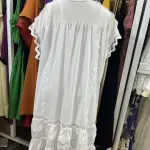 White Cotton Lace Kaftan or Maxi Dress, with Silhouette, tiered Ruffles, and intricate lace detailing.