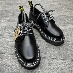 Dr. Martens leather oxfords