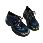 Balenciaga Patent Leather Platform Derbies, in metal-toe detail and a thick, chunky sole.
