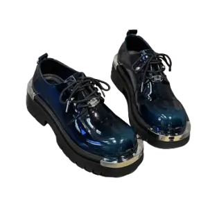 Balenciaga Patent Leather Platform Derbies, in metal-toe detail and a thick, chunky sole.