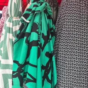 Thrift striking Green crepe Material featuring a bold, Black abstract print Double Length