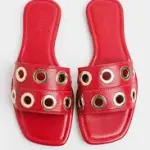 Berness Red Patent Grommet Slide Sandals.