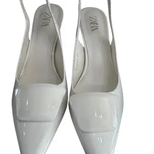 Zara Faux patent slingback shoes in a pointed Toe and a stiletto Heel.