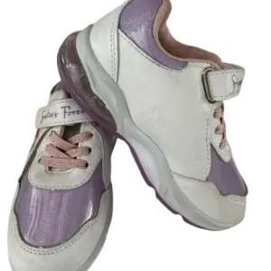 White and purple children's sneakers feature pink laces and hook-and-loop straps labeled "Sisters Forever