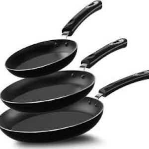 T-fal non-stick 3-piece fry pan set, packaged in plastic. This set typically includes three different sizes for versatility in cooking, such as 8-inch, 9.5-inch, and 11-